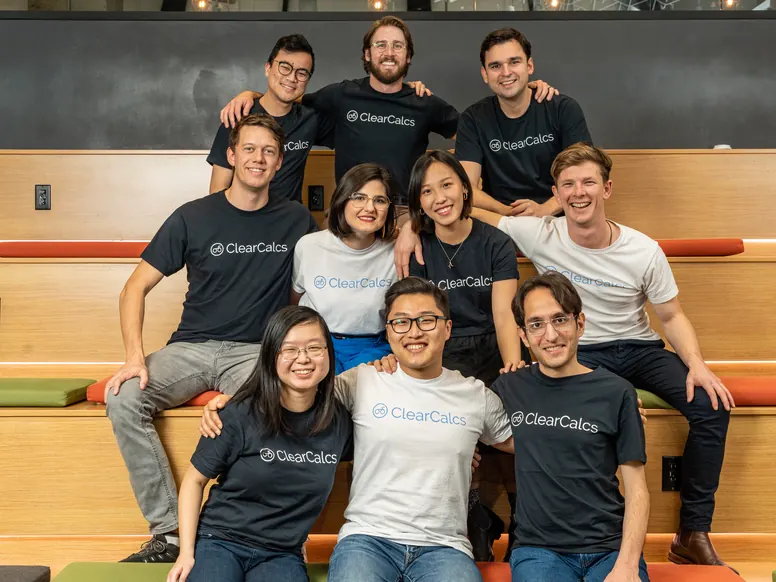 Ten ClearCalcs team members on the tiered seating in the Toronto office, November 2022
